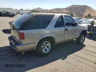 ✅ 2000 Chevrolet Blazer LS • VIN: 1GNCS18W1YK259268 • Lot: 80156565. Wystawiony na Copart z przebiegiem 287 216 mil. Bezpłatny archiwum sprzedaży aukcyjnych z USA i szczegółowy raport historii pojazdu na DreamBid. Zdjęcie 3.