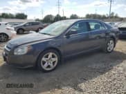 ✅ 2011 Chevrolet Malibu 1LS • VIN: 1G1ZB5E11BF203343 • Lot: 72412874. Listed on Copart with 121,674 mi. Free auction sales archive from the USA and detailed vehicle history report at DreamBid. Image 1.