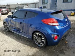 ✅ 2016 Hyundai Veloster Turbo • VIN: KMHTC6AE7GU285294 • Lot: 79255504. Wystawiony na Copart z przebiegiem 109 545 mil. Bezpłatny archiwum sprzedaży aukcyjnych z USA i szczegółowy raport historii pojazdu na DreamBid. Zdjęcie 2.