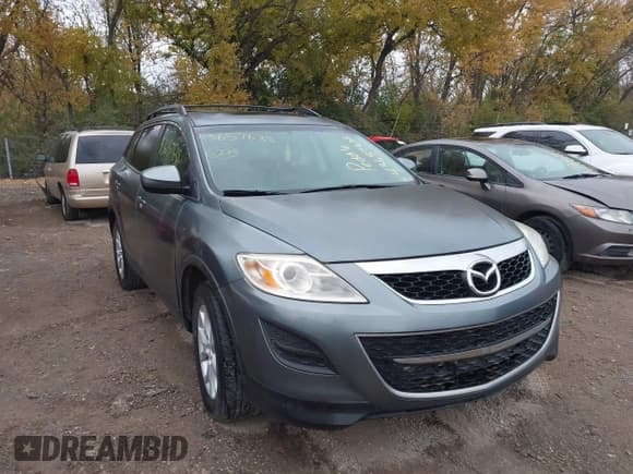 ✅ 2012 Mazda CX-9 Touring • VIN: JM3TB2CAXC0356247 • Lot: 43657638. Listed on IAAI with 208,708 mi. Free auction sales archive from the USA and detailed vehicle history report at DreamBid. Image 1.