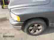 2002 Dodge 1500 ST z VIN 1D3HA18Z22J214386, wystawiony jako IAAI lot #42595976 z przebiegiem 410 608 mil mil oraz . Historia ofert i sprzedaży dostępna na DreamBid. Obrazek 13.