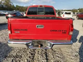 2004 Dodge Dakota SLT z VIN 1D7HL48K04S781707, wystawiony jako Copart lot #74326284 z przebiegiem 190 531 mil mil oraz Czysty tytuł • Clean title. Historia ofert i sprzedaży dostępna na DreamBid. Obrazek 6.