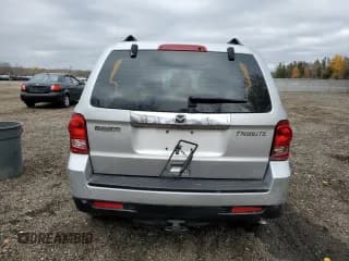 ✅ 2010 Mazda Tribute Sport • VIN: 4F2CY0C77AKM01954 • Лот: 75888394. Опубликован ранее на Copart с пробегом 197 980 миль. Бесплатный доступ к архиву аукционных продаж из США и подробный отчёт об истории автомобиля на DreamBid. Изображение 6.