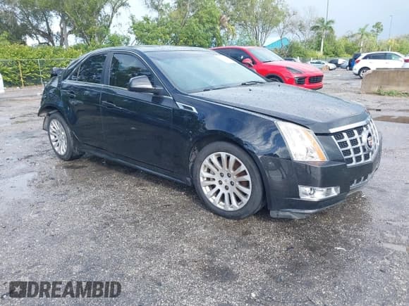 ✅ 2012 Cadillac CTS Premium • VIN: 1G6DP5E30C0146497 • Lot: 43841827. Listed on IAAI with 82,703 mi. Free auction sales archive from the USA and detailed vehicle history report at DreamBid. Image 1.