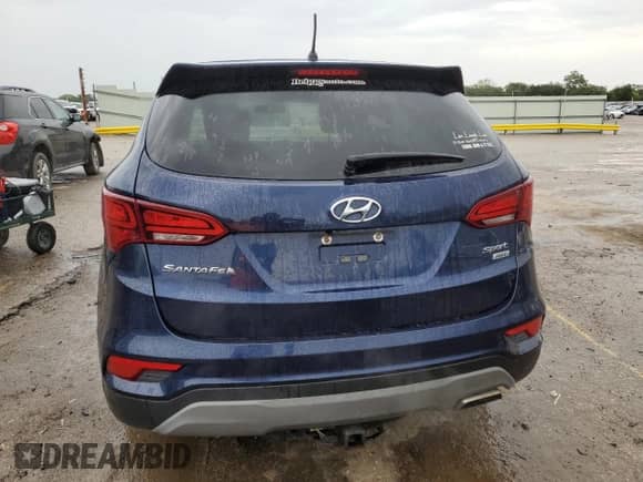 2018 Hyundai Santa Fe 2.4L z VIN 5XYZTDLBXJG548442, wystawiony jako Copart lot #71490095 z przebiegiem 125 249 mil mil oraz Szkoda całkowita • Salvage title. Historia ofert i sprzedaży dostępna na DreamBid. Obrazek 6.