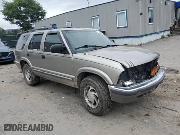 2001 Chevrolet Blazer LT с VIN 1GNDT13W812158646, выставлен на аукционе Copart как лот 73664804 с пробегом 182 735 миль миль и Списание • Salvage title. История ставок и продаж доступна на DreamBid. Изображение 4.