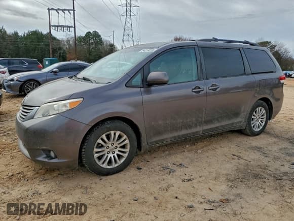 ✅ 2012 Toyota Sienna XLE • VIN: 5TDYK3DC5CS255778 • Lot: 94214015. Listed on Copart with 114,207 mi. Free auction sales archive from the USA and detailed vehicle history report at DreamBid. Image 1.