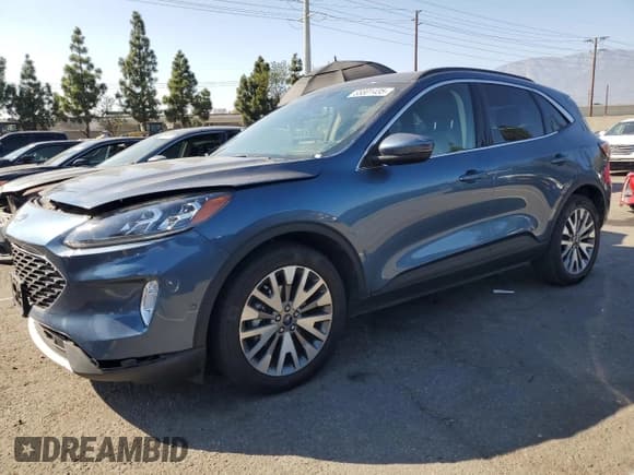✅ 2020 Ford Escape Titanium Hybrid • VIN: 1FMCU0DZ0LUC74768 • Лот: 85801435. Опубликован ранее на Copart с пробегом 69 725 миль. Бесплатный доступ к архиву аукционных продаж из США и подробный отчёт об истории автомобиля на DreamBid. Изображение 1.