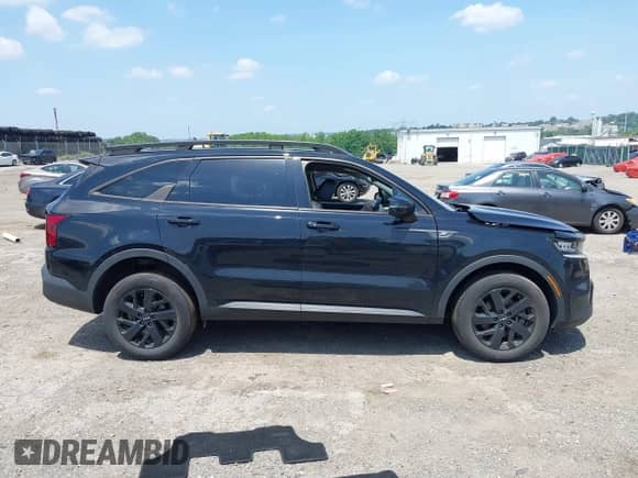 2022 Kia Sorento X-Line S z VIN 5XYRLDLC9NG149780, wystawiony jako IAAI lot #42567100 z przebiegiem 62 097 mil mil oraz . Historia ofert i sprzedaży dostępna na DreamBid. Obrazek 13.