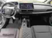 2023 Toyota Prius LE with VIN JTDADABU9P3002451, listed as a Copart auction lot 80668485 with 16,977 mi miles and Salvage title. Bid and sale history available at DreamBid. Image 8.