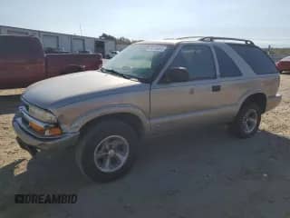 2003 Chevrolet Blazer LS с VIN 1GNCS18X53K123968, выставлен на аукционе Copart как лот 74516684 с пробегом 163 767 миль миль и Чистый • Clean title. История ставок и продаж доступна на DreamBid. Изображение 1.