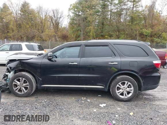 ✅ 2013 Dodge Durango Crew • VIN: 1C4RDJDG2DC530631 • Lot: 43540833. Listed on IAAI with 194,649 mi. Free auction sales archive from the USA and detailed vehicle history report at DreamBid. Image 14.