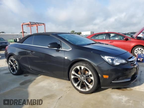 ✅ 2016 Buick Cascada Premium • VIN: W04WT3N55GG040464 • Lot: 73645414. Wystawiony na Copart z przebiegiem Nie podano. Bezpłatny archiwum sprzedaży aukcyjnych z USA i szczegółowy raport historii pojazdu na DreamBid. Zdjęcie 4.