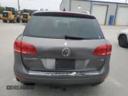 ✅ 2013 Volkswagen Touareg Lux • VIN: WVGEF9BP9DD002651 • Lot: 63206245. Listed on Copart with 186,860 mi. Free auction sales archive from the USA and detailed vehicle history report at DreamBid. Image 6.