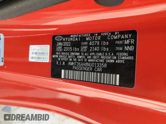 2022 Hyundai Veloster z VIN KMHT36AH8NU013358, wystawiony jako Copart lot #83589574 z przebiegiem Nie podano mil oraz Szkoda całkowita • Salvage title. Historia ofert i sprzedaży dostępna na DreamBid. Obrazek 12.