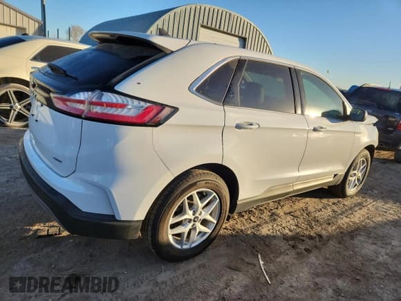 ✅ 2023 Ford Edge SEL • VIN: 2FMPK4J99PBA25173 • Lot: 91123095. Listed on Copart with 59,189 mi. Free auction sales archive from the USA and detailed vehicle history report at DreamBid. Image 3.
