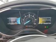 ✅ 2015 Ford Fusion Titanium Hybrid • VIN: 3FA6P0RU6FR179817 • Lot: 95251945. Wystawiony na Copart z przebiegiem 115 636 mil. Bezpłatny archiwum sprzedaży aukcyjnych z USA i szczegółowy raport historii pojazdu na DreamBid. Zdjęcie 9.