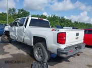 ✅ 2018 Chevrolet Silverado 2500HD LT • VIN: 1GC1KVEY0JF208002 • Лот: 42542810. Опубликован ранее на IAAI с пробегом 104 359 миль. Бесплатный доступ к архиву аукционных продаж из США и подробный отчёт об истории автомобиля на DreamBid. Изображение 3.