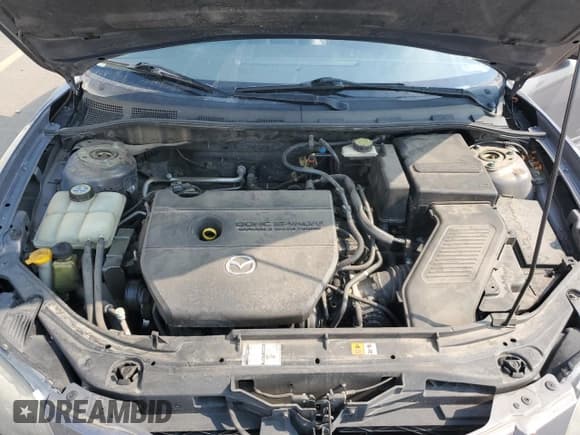 ✅ 2007 Mazda 3 S Touring • VIN: JM1BK323671700105 • Lot: 71399275. Listed on Copart with 111,925 mi. Free auction sales archive from the USA and detailed vehicle history report at DreamBid. Image 11.