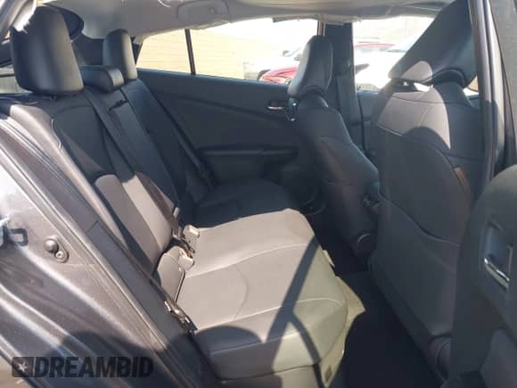 2021 Toyota Prius L Eco with VIN JTDKAMFU4M3144985, listed as a IAAI auction lot 42443957 with 20,816 mi miles and . Bid and sale history available at DreamBid. Image 8.