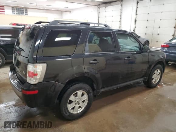 ✅ 2011 Mercury Mariner • VIN: 4M2CN9BG9BKJ06722 • Lot: 62014585. Listed on Copart with 242,214 mi. Free auction sales archive from the USA and detailed vehicle history report at DreamBid. Image 3.