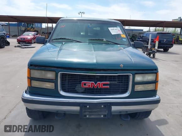 ✅ 1998 GMC Suburban • VIN: 1GKGK26J4WJ734958 • Lot: 41878070. Listed on IAAI with 131,528 mi. Free auction sales archive from the USA and detailed vehicle history report at DreamBid. Image 12.