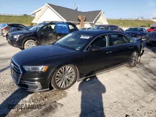 ✅ 2019 Audi A8 • VIN: WAU8DAF87KN002177 • Лот: 50498494. Опубликован ранее на Copart с пробегом 90 111 миль. Бесплатный доступ к архиву аукционных продаж из США и подробный отчёт об истории автомобиля на DreamBid. Изображение 1.