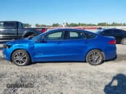 ✅ 2017 Ford Fusion Hybrid SE • VIN: 3FA6P0LU2HR382361 • Lot: 43474850. Listed on IAAI with 128,991 mi. Free auction sales archive from the USA and detailed vehicle history report at DreamBid. Image 14.