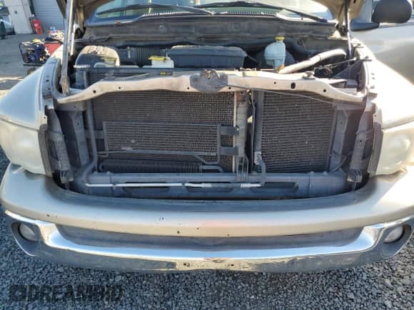 2005 Dodge 1500 SLT z VIN 1D7HU18NX5S217585, wystawiony jako Copart lot #76047974 z przebiegiem Nie podano mil oraz Szkoda całkowita • Salvage title. Historia ofert i sprzedaży dostępna na DreamBid. Obrazek 11.