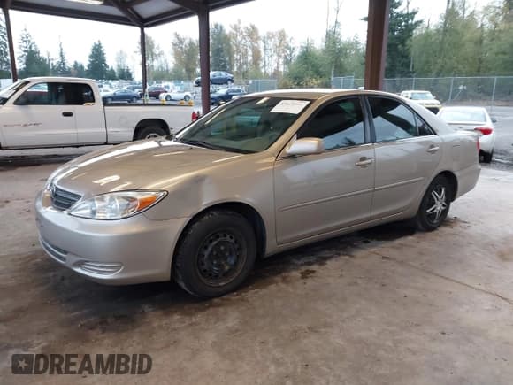 ✅ 2003 Toyota Camry XLE • VIN: 4T1BE30K13U740047 • Lot: 43628001. Listed on IAAI with 198,432 mi. Free auction sales archive from the USA and detailed vehicle history report at DreamBid. Image 2.
