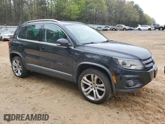 ✅ 2012 Volkswagen Tiguan LE • VIN: WVGAV7AX9CW555942 • Lot: 51303575. Listed on Copart with 130,491 mi. Free auction sales archive from the USA and detailed vehicle history report at DreamBid. Image 4.