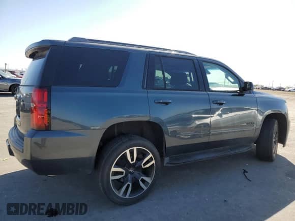 2019 Chevrolet Tahoe Premier z VIN 1GNSKCKJ9KR200083, wystawiony jako Copart lot #57910955 z przebiegiem 53 126 mil mil oraz Szkoda całkowita • Salvage title. Historia ofert i sprzedaży dostępna na DreamBid. Obrazek 3.