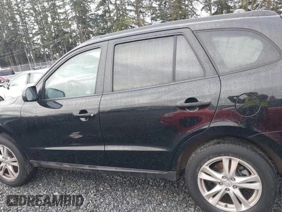 ✅ 2011 Hyundai Santa Fe Limited • VIN: 5XYZHDAG5BG002875 • Lot: 41233043. Listed on IAAI with 64,232 mi. Free auction sales archive from the USA and detailed vehicle history report at DreamBid. Image 14.