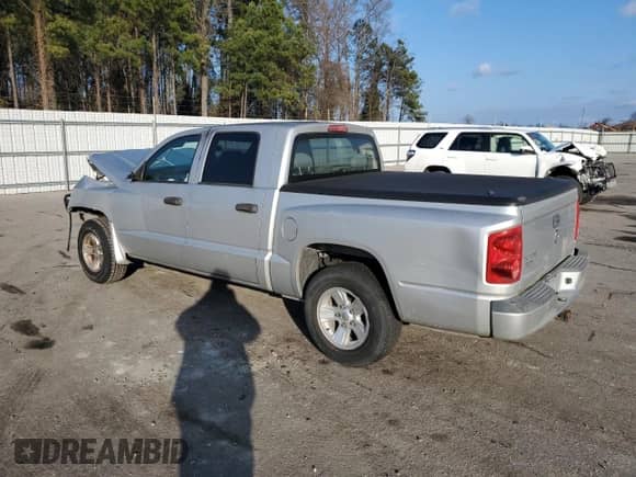 2009 Dodge Dakota ST с VIN 1D7HE28K99S785406, выставлен на аукционе Copart как лот 40571034 с пробегом 161 444 миль миль и Списание • Salvage title. История ставок и продаж доступна на DreamBid. Изображение 2.