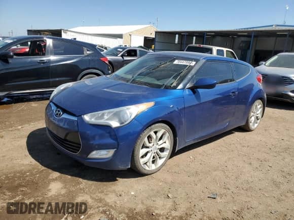 2015 Hyundai Veloster z VIN KMHTC6AD0FU241885, wystawiony jako Copart lot #70447094 z przebiegiem 175 075 mil mil oraz Szkoda całkowita • Salvage title. Historia ofert i sprzedaży dostępna na DreamBid. Obrazek 1.