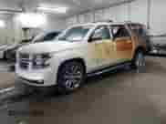 2015 Chevrolet Suburban LTZ z VIN 1GNSKKKC1FR734292, wystawiony jako Copart lot #69274444 z przebiegiem 78 973 mil mil oraz Szkoda całkowita • Salvage title. Historia ofert i sprzedaży dostępna na DreamBid. Obrazek 1.