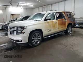 2015 Chevrolet Suburban LTZ z VIN 1GNSKKKC1FR734292, wystawiony jako Copart lot #69274444 z przebiegiem 78 973 mil mil oraz Szkoda całkowita • Salvage title. Historia ofert i sprzedaży dostępna na DreamBid. Obrazek 1.