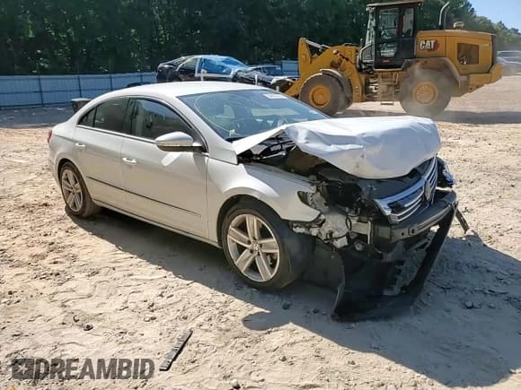 ✅ 2016 Volkswagen CC Sport • VIN: WVWBP7AN2GE516574 • Лот: 64862685. Опубликован ранее на Copart с пробегом 71 627 миль. Бесплатный доступ к архиву аукционных продаж из США и подробный отчёт об истории автомобиля на DreamBid. Изображение 14.