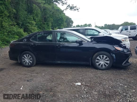 2022 Toyota Camry Hybrid LE с VIN 4T1C31AK3NU570645, выставлен на аукционе IAAI как лот 42659916 с пробегом 19 420 миль миль и . История ставок и продаж доступна на DreamBid. Изображение 13.