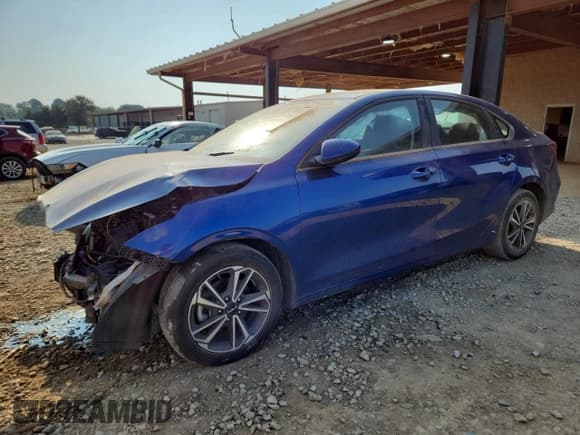 ✅ 2022 Kia Forte LXS • VIN: 3KPF24ADXNE448208 • Лот: 81507105. Опубликован ранее на Copart с пробегом 80 200 миль. Бесплатный доступ к архиву аукционных продаж из США и подробный отчёт об истории автомобиля на DreamBid. Изображение 1.