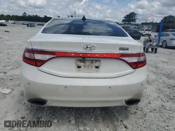 ✅ 2013 Hyundai Azera • VIN: KMHFH4JG8DA310835 • Лот: 68177595. Опубликован ранее на Copart с пробегом 165 253 миль. Бесплатный доступ к архиву аукционных продаж из США и подробный отчёт об истории автомобиля на DreamBid. Изображение 6.