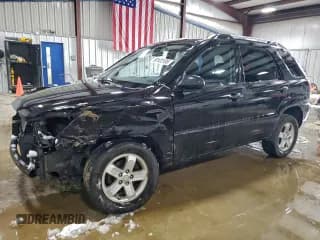 ✅ 2009 Kia Sportage LX • VIN: KNDJE723897580446 • Лот: 93122185. Опубликован ранее на Copart с пробегом 168 269 миль. Бесплатный доступ к архиву аукционных продаж из США и подробный отчёт об истории автомобиля на DreamBid. Изображение 1.