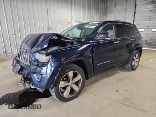 ✅ 2014 Jeep Grand Cherokee Overland • VIN: 1C4RJFCG1EC233696 • Lot: 86623075. Listed on Copart with 140,470 mi. Free auction sales archive from the USA and detailed vehicle history report at DreamBid. Image 1.