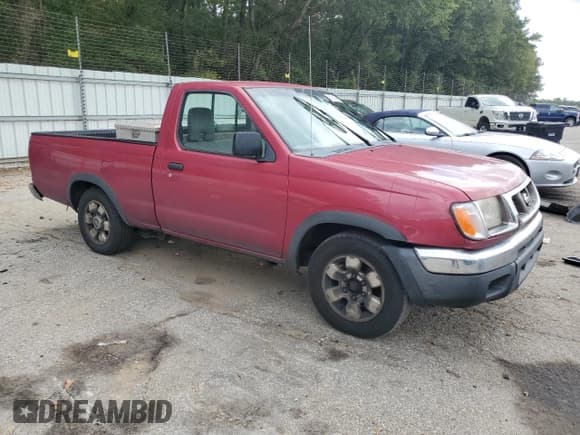 ✅ 1998 Nissan Frontier XE • VIN: 1N6DD21S3WC343701 • Lot: 85781925. Listed on Copart with 287,967 mi. Free auction sales archive from the USA and detailed vehicle history report at DreamBid. Image 4.