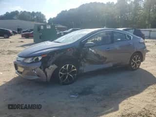 2018 Chevrolet Volt Premier с VIN 1G1RB6S59JU108357, выставлен на аукционе Copart как лот 80606655 с пробегом Не указан миль и Списание • Salvage title. История ставок и продаж доступна на DreamBid. Изображение 1.