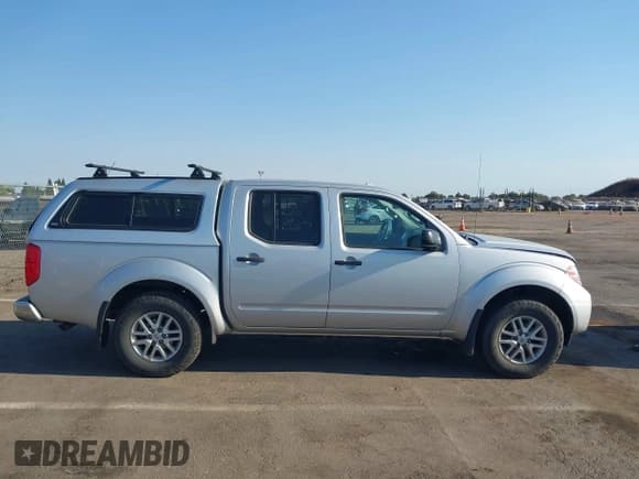 ✅ 2016 Nissan Frontier Pro-4X • VIN: 1N6AD0EV4GN771911 • Lot: 42955470. Listed on IAAI with 113,355 mi. Free auction sales archive from the USA and detailed vehicle history report at DreamBid. Image 13.