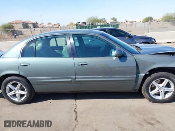 ✅ 1998 Buick Park Avenue Ultra • VIN: 1G4CU5213W4624554 • Lot: 41599231. Wystawiony na IAAI z przebiegiem 145 798 mil. Bezpłatny archiwum sprzedaży aukcyjnych z USA i szczegółowy raport historii pojazdu na DreamBid. Zdjęcie 13.