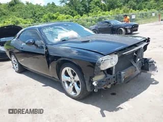 ✅ 2013 Dodge Challenger SXT • VIN: 2C3CDYAG8DH511232 • Lot: 42586511. Wystawiony na IAAI z przebiegiem 207 910 mil. Bezpłatny archiwum sprzedaży aukcyjnych z USA i szczegółowy raport historii pojazdu na DreamBid. Zdjęcie 1.