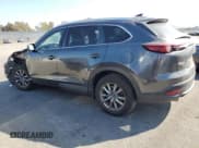 ✅ 2018 Mazda CX-9 Sport • VIN: JM3TCBBY1J0231663 • Lot: 91067785. Listed on Copart with 102,561 mi. Free auction sales archive from the USA and detailed vehicle history report at DreamBid. Image 2.