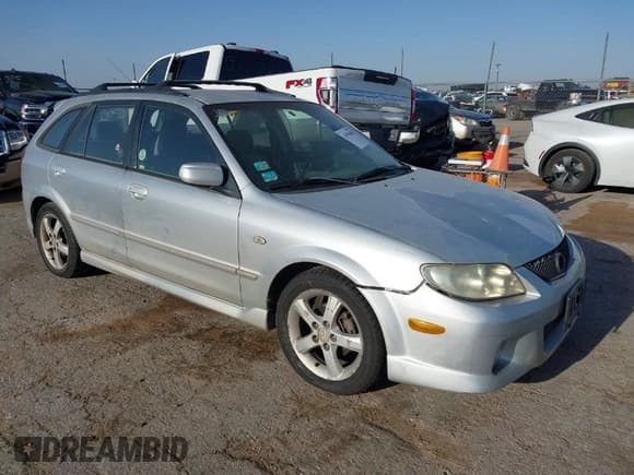 ✅ 2003 Mazda Protege • VIN: JM1BJ245131122498 • Lot: 41990488. Wystawiony na IAAI z przebiegiem 170 880 mil. Bezpłatny archiwum sprzedaży aukcyjnych z USA i szczegółowy raport historii pojazdu na DreamBid. Zdjęcie 1.